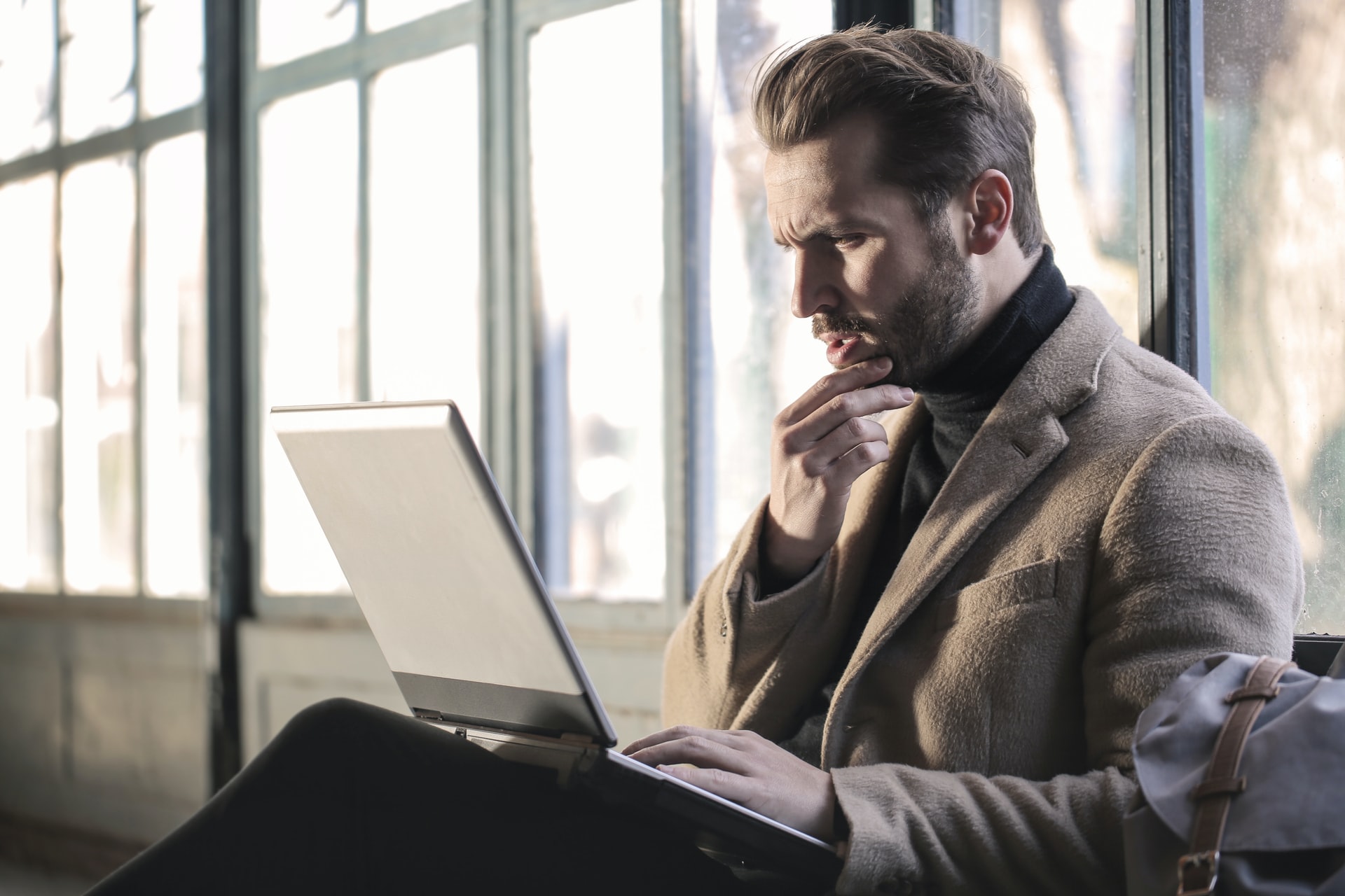 man working on laptop